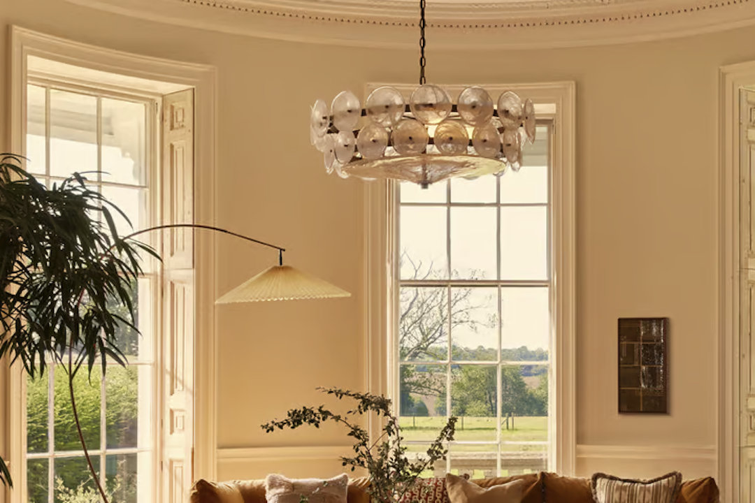 Golden-Trimmed Crystal Chandelier: A Luxurious Statement Piece